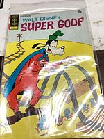 Front view of bagged Gold Key Walt Disney Super Goof comic showing full cover art and condition