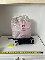 Bag, hand pump, measurement tape visible
