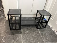 Front view of shelving unit showing cube sides and center shelf