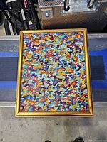 Frontal view of framed abstract painting