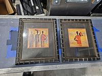 Both framed prints side by side showing size and frames
