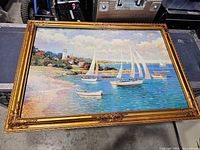 Full view of seascape painting with frame