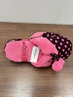 Top view of slippers showing La Senza label and polka dot design