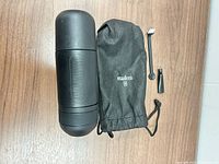 Espresso maker, pouch, scoop-brush, adapter overview