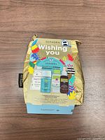 Front of sealed Sephora Wishing You gift set showing pouch and sleeve