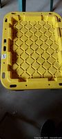 Yellow plastic tote exterior