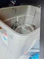 Large grey tote with clear glass casserole dish and lid visible
