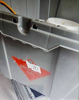 Grey plastic storage tote with Canadian Tire logo