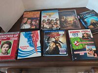 All eight movie discs laid out on table
