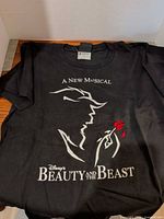Front view of T-shirt showing full graphic and tag
