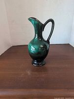 Full view of Blue Mountain Pottery jug front and right side
