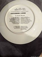 Reverse of the collector plate showing edition details and maker mark