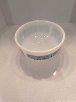Full view of Fire King bowl showing shape and color
