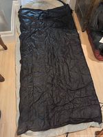 Sleeping bag laid out flat showing full length