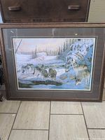 Front view of framed wolf print
