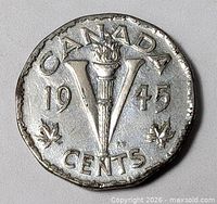 Reverse showing torch V design, date, Canada legend