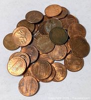 Pile of 40 Lincoln cents showing obverse and reverse designs