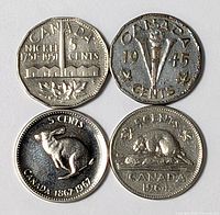 All four Canadian five-cent coins front faces visible