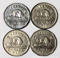 Front faces showing dates 1952, 1939, 1941, 1953