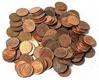 Pile of Canadian pennies showing obverse and reverse designs