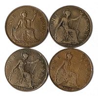 All four pennies heads up with dates visible