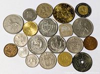 Overhead view of full group of 23 mixed coins