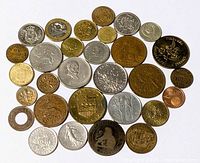 Full layout of approximately 27 mixed world coins