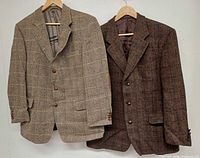 Front view of both Harris Tweed blazers on hangers