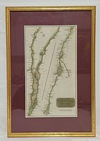 Full view of framed map showing frame, mat, and artwork