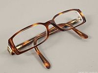 Three-quarter view of Bvlgari eyeglasses showing front and temples