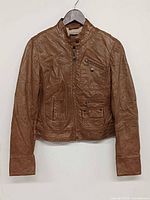 Front view of brown leather biker jacket