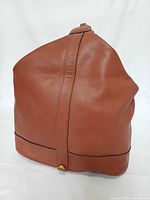 Front view showing leather texture and color
