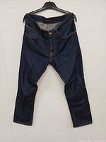 Front view of Nudie Jeans Co. dark indigo jeans