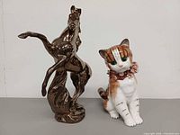 Front view of both figurines