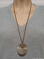 Necklace worn on mannequin front view