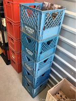 Five stacked blue plastic crates with 'Beatrice Foods' branding on the side, photo showing the overall lot and condition.
