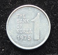Obverse showing THE BANK OF KOREA 1975 and denomination 1