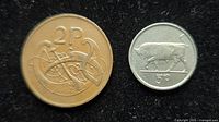 Obverse sides showing 2P Celtic bird design and 5P bull design