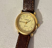 Front view showing dial, case and strap