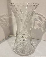 Full view of vase front profile showing etched floral pattern