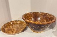 Mixing bowl and matching underplate showing overall form and glaze