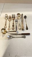 All 11 flatware pieces laid out for overview