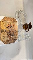 Group shot of print, bowl, pitcher, jar