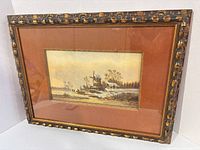 Frontal view of framed painting showing frame and mat