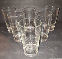 All six clear etched starburst highball glasses grouped
