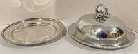 base plate and domed cover side by side