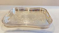 Full view of silver-plated tray showing shape and gallery edge