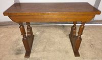front view of oak accent table showing overall design