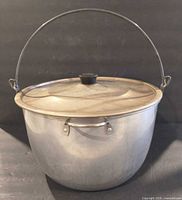 Overall view of aluminum stockpot with bail handle and lid