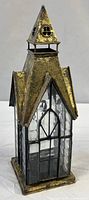 Full view of cathedral-shaped candle holder